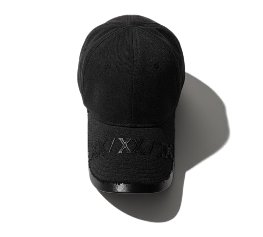 Black cap with a brand logo on a white background